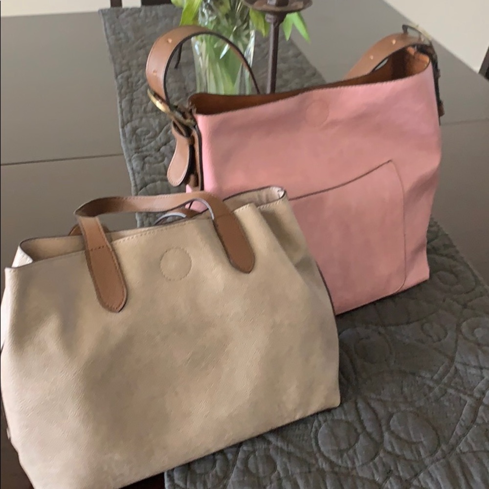 Two designer hand bags.
